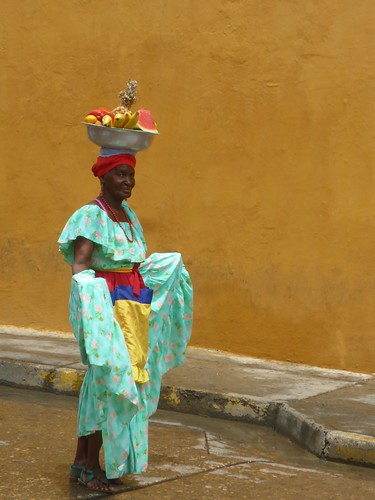 Lady carrying fruit on her head